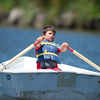 A boy in a row boat